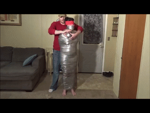 ginaraemichaels.com - Gina Mummified in 6 layers and sent away thumbnail